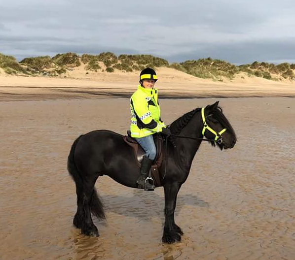 fell pony mare and rider on the beach at Seaton Carew